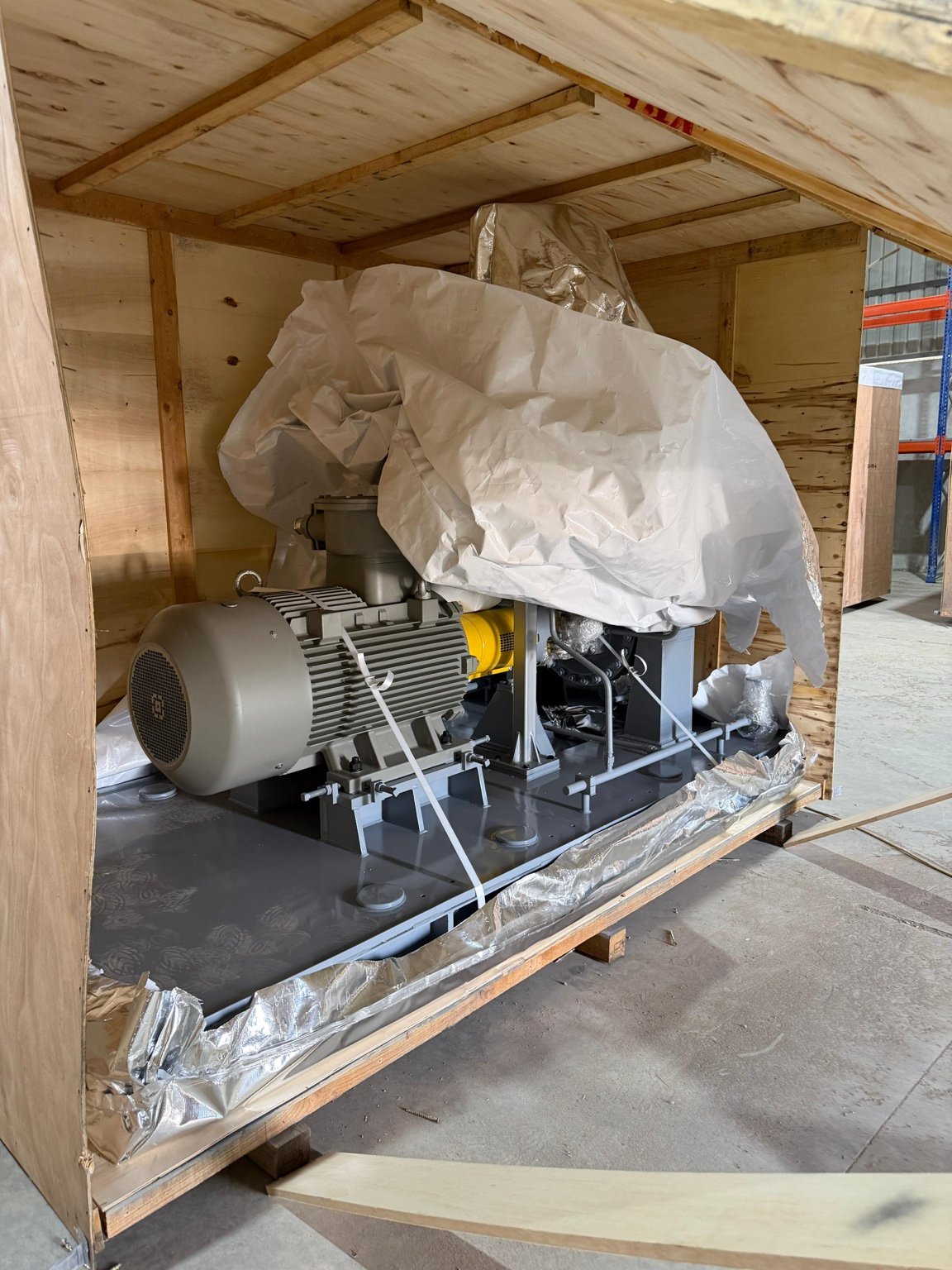 Motor-driven pump package preserved in export crate